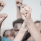 Protesters raise their fists